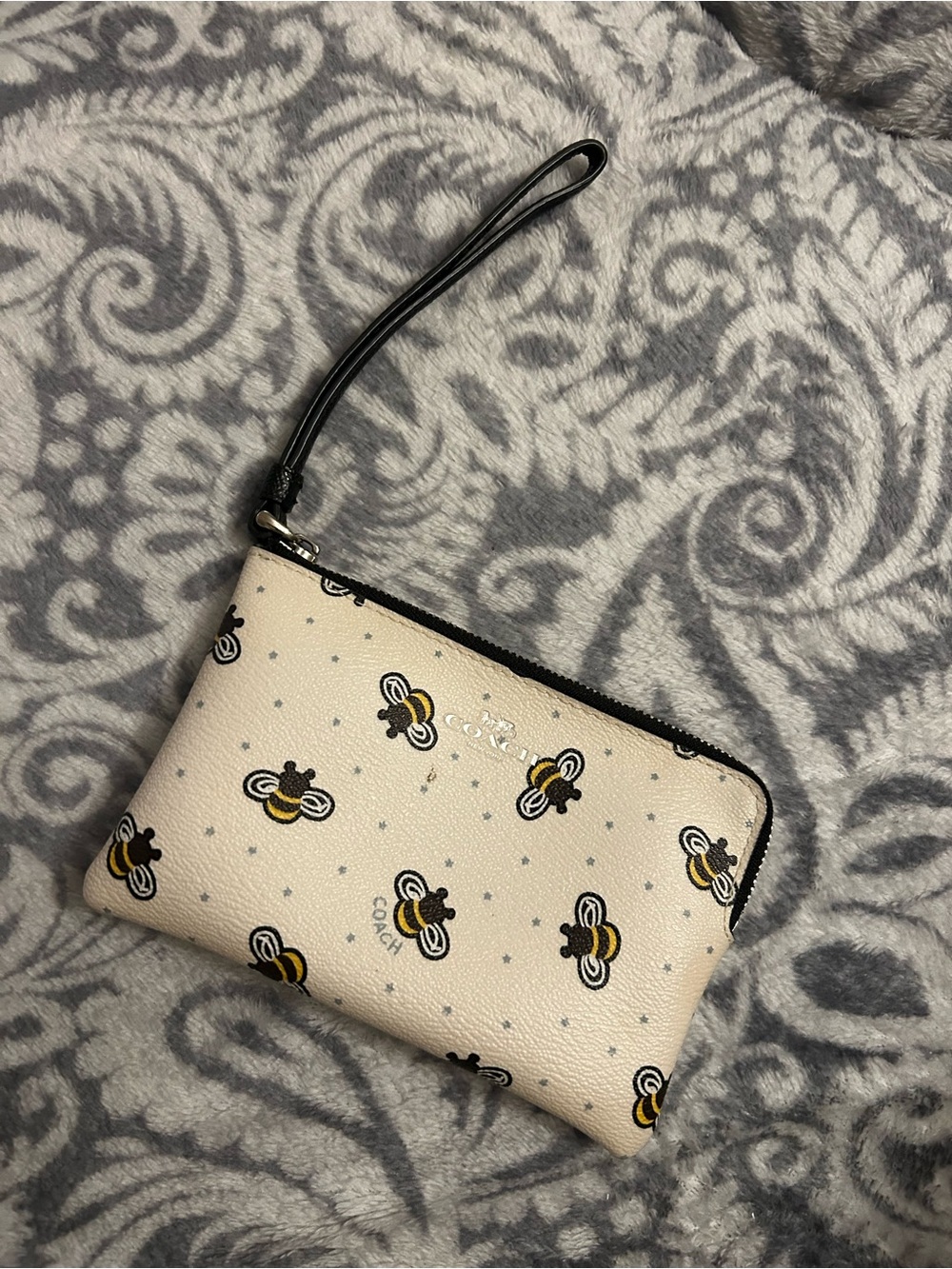 COACH Cream Bee Print Leather Wristlet Pouch with Black Strap